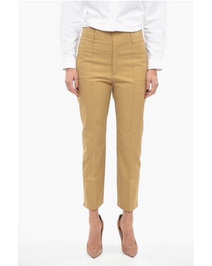 Pantalones de algodón con pliegues delanteros y corte cónico en marrón