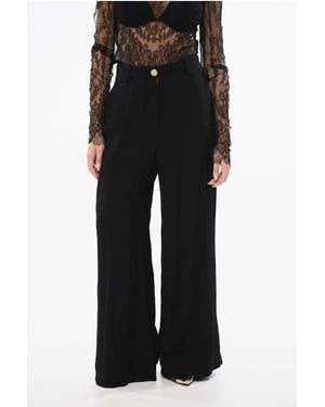 Pantalones anchos de crepé de viscosa en color negro