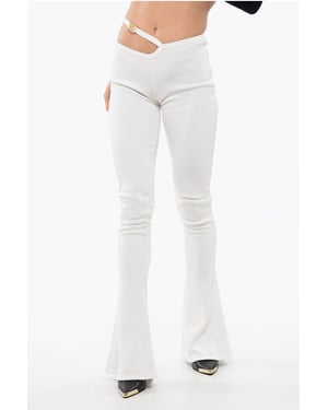 Leggings acampanados con abertura en beige