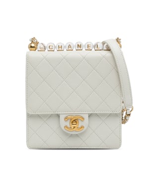 Bolso de cuero acolchado cruzado