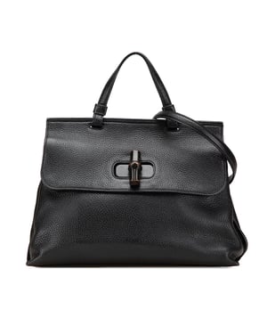 Bolso de cuero con asa de bambú