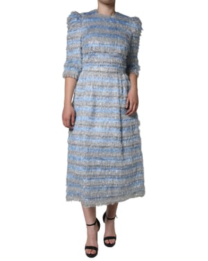 Vestido midi con franjas metálicas y flecos