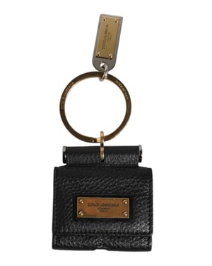 Llave de cuero con anillo de metal