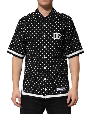Polo de manga corta de color negro con estampado de lunares de Dolce & Gabbana