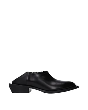 Mules de Cuero Negros Moschino