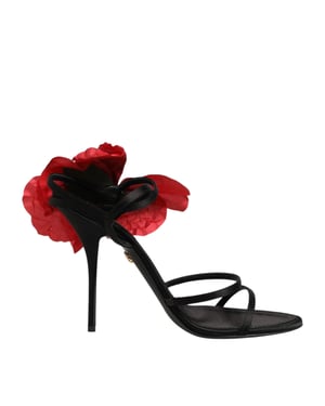 Sandalias de tacón con tiras de cuero negro y flores de Dolce & Gabbana