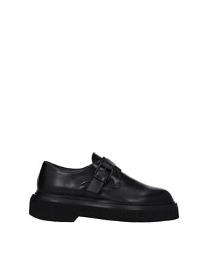 Max Mara Oxford y Derby de Cuero Negros