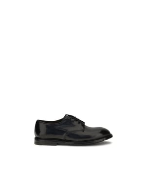 Premiata Oxfords y Derbys de cuero negro de ternera Bos Taurus