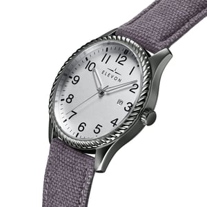 Reloj Elevon Crosswind con correa de cuero superpuesta en lona y fecha