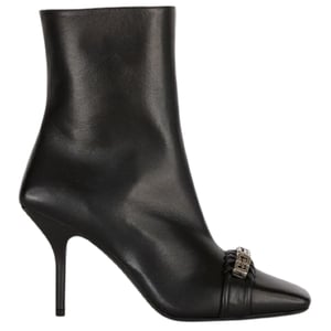 Tacones tipo botin negros con diseo tejido G de Givenchy