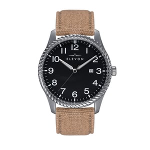Reloj Elevon Crosswind con correa de cuero superpuesta en lona y fecha