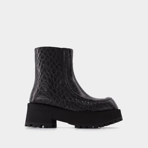 Botas negras de piel con cremallera