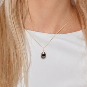 Colgante articulado perla tahitiana de 9-10 mm de oro blanco
