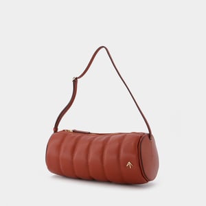 Bolsa cilíndrica acolchada de piel roja