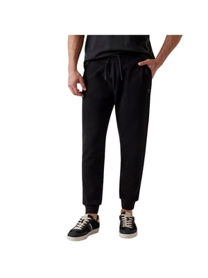 Pantalones deportivos triangulares mini Guess para hombre