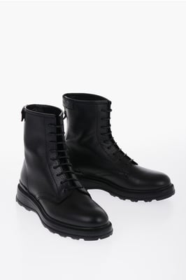 Botas de combate de cuero texturizado con cremallera en color negro