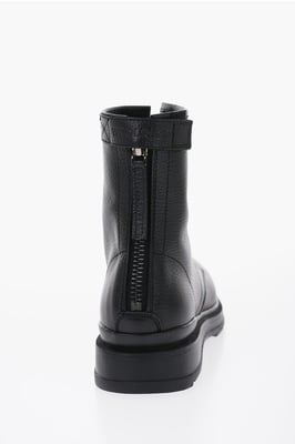 Botas de combate de cuero texturizado con cremallera en color negro