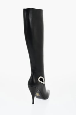 Botas altas de piel con detalles recortados y tacón de 11 cm en color negro