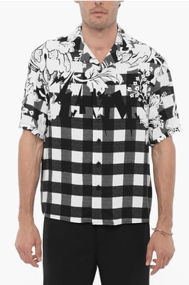 Camisa de corte cuadrado con doble estampado en blanco y negro