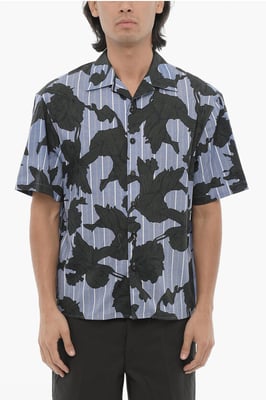 Camisa de corte cuadrado con motivo floral en azul y negro