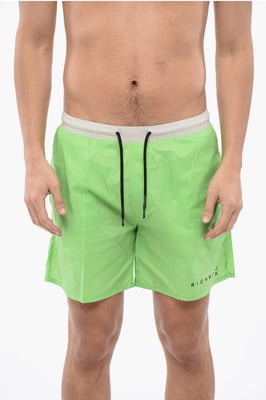 Traje de baño bóxer bicolor en blanco y verde