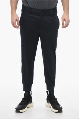 Pantalones JACK de tiro bajo y corte ajustado con puños en azul