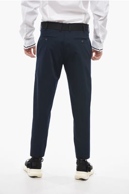 Pantalones TOM Slim Fit con bordes en contraste y botones en los tobillos en azul