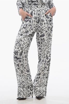 Pantalones Palazzo de pijama de satén con estampado de tatuajes en blanco y negro