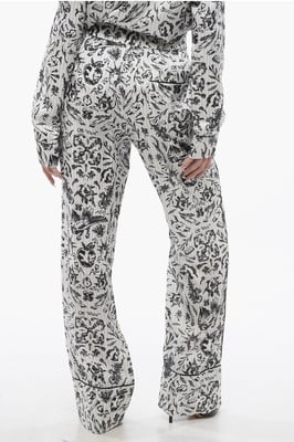 Pantalones Palazzo de pijama de satén con estampado de tatuajes en blanco y negro