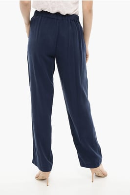 Pantalones acampanados de un solo pliegue en azul