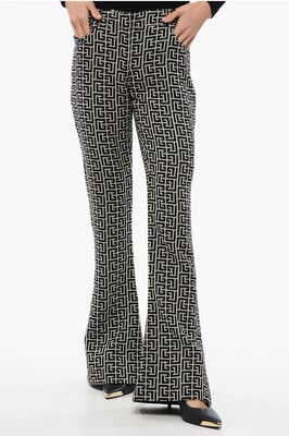 Pantalones acampanados de tiro bajo de lana en blanco y negro