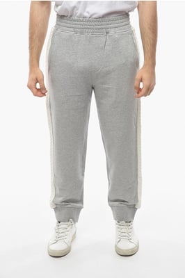 Pantalones deportivos holgados de algodón con bandas laterales de punto en gris