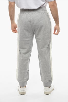 Pantalones deportivos holgados de algodón con bandas laterales de punto en gris