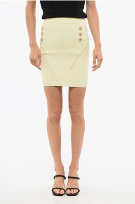 Minifalda de punto con diseño cruzado en amarillo
