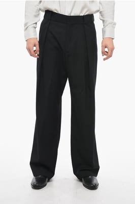Pantalones anchos de lana con pliegues delanteros en negro