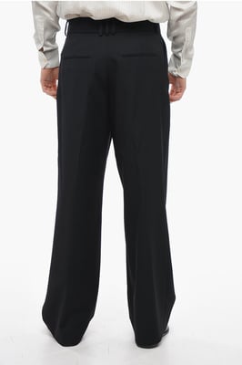 Pantalones anchos de lana con pliegues delanteros en negro