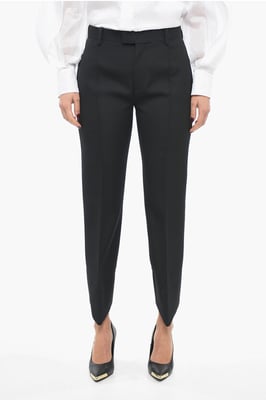 Pantalones de lana con pliegues delanteros y diseño curvo en negro