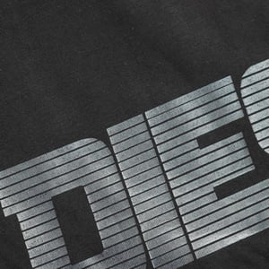 Camiseta Negra Con Caviar Y Logotipo Monótono De Diesel