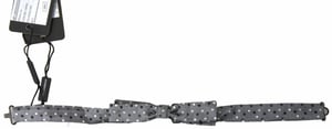 Corbata de moño gris con lunares