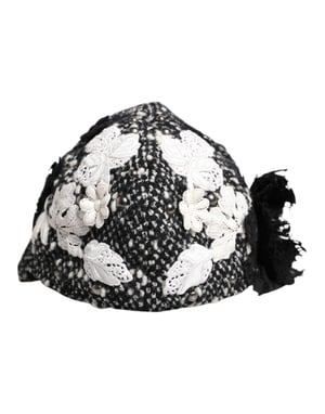 Sombrero cloche de lana negra embellecido con flores blancas