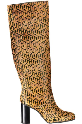 Las botas de pelo de ternera con monograma hasta la rodilla