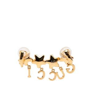 Pendiente de oreja de cristal en forma de estrella dorado, de segunda mano