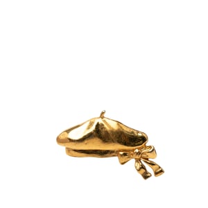 Broche de sombrero boina chapado en oro de segunda mano