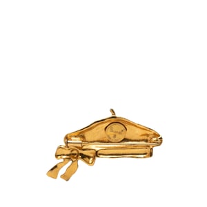 Broche de sombrero boina chapado en oro de segunda mano