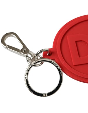 Llavero de metal de latón plateado con logo DG en goma roja de Dolce & Gabbana