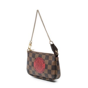 Louis Vuitton Mini Pochette Accessoires  en  Brown Lienzo recubierto