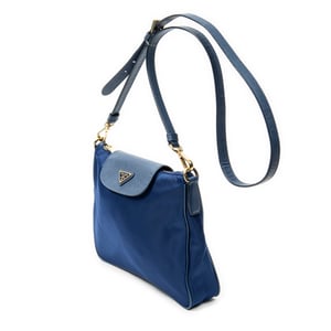 Prada Small Zip Crossbody  en  Blue Lienzo