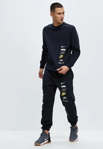 Chándal negro de tejido polar con logo pequeño Club de Nike