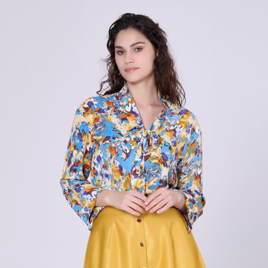 Ascot-tie blouse and abstract print