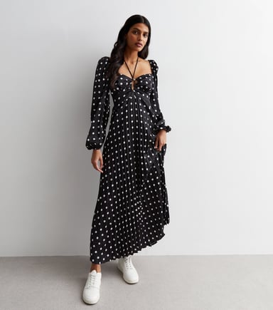 Vestido largo con abertura y plisado de lunares
